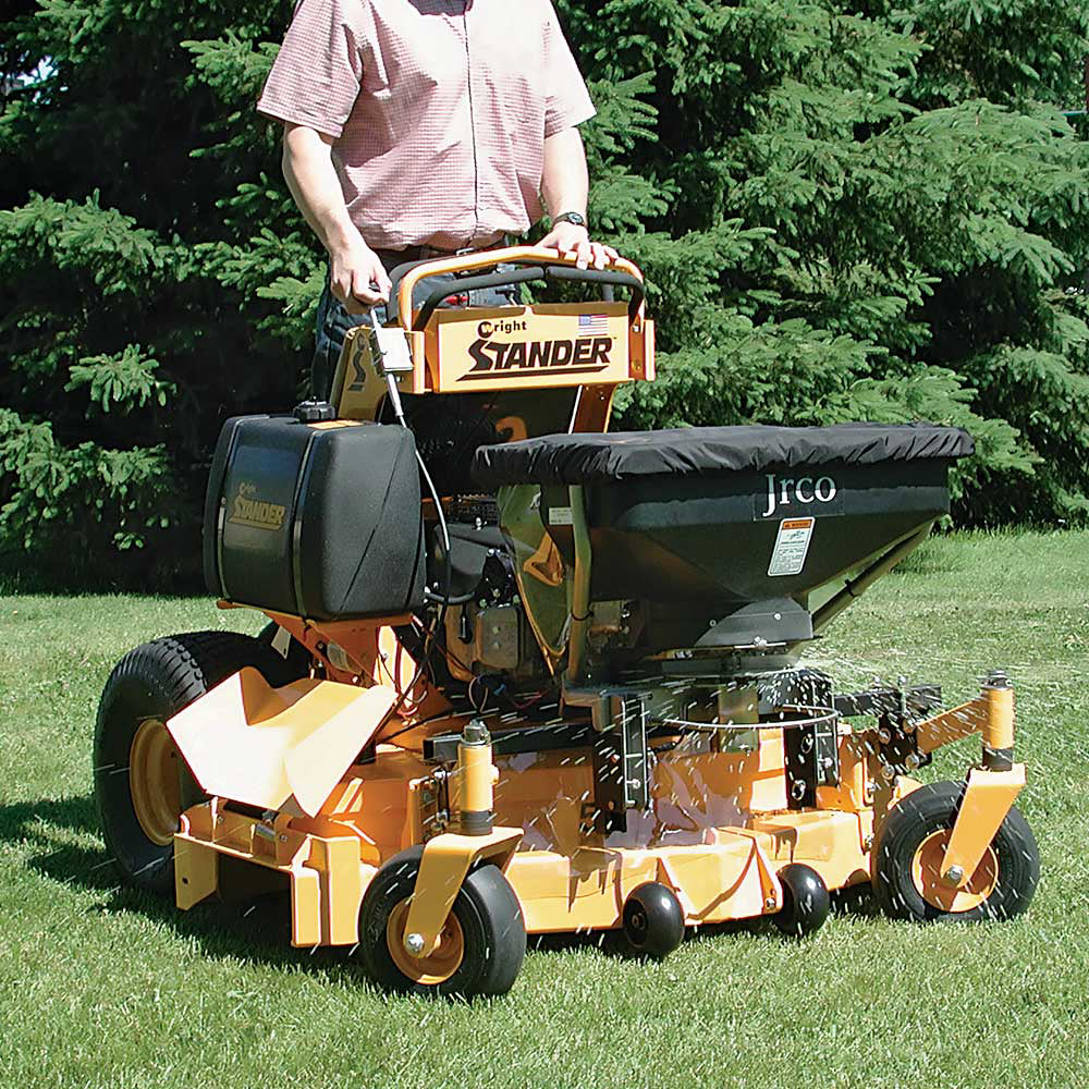 Pull behind discount mower fertilizer spreader